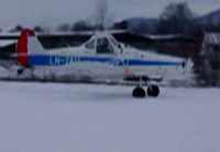 LN-TAU med slep p� Hokksund 23/12-03 (3 MB Foto: Anders Bj�rnestad)